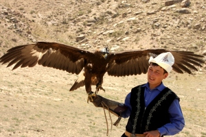 The Eagle Hunter preparing to demonstrate how he hunts with the bird.