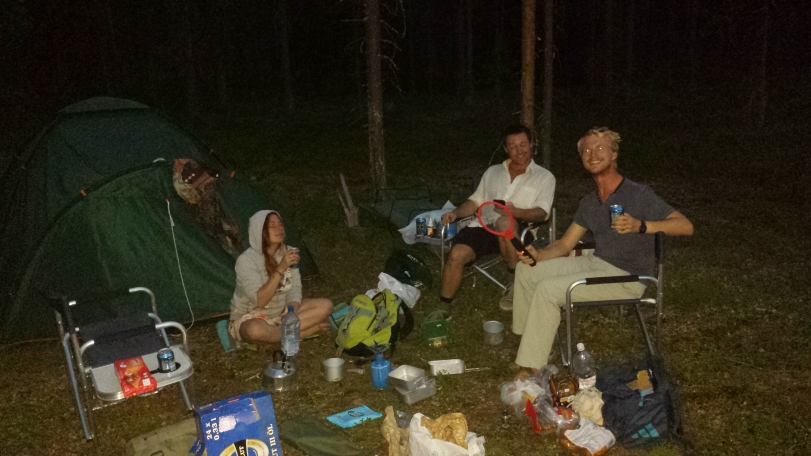 Camping out in the Finnish forests. The tennis racket thing in my hand is an electrified bug-zapper - our attempt at a defence against the millions of mosquitoes
